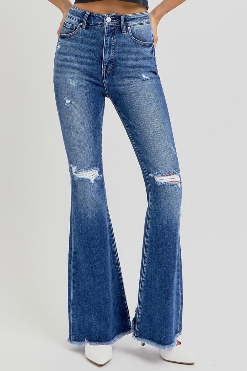 Risen High Rise Distressed Raw Hem Flare Jeans